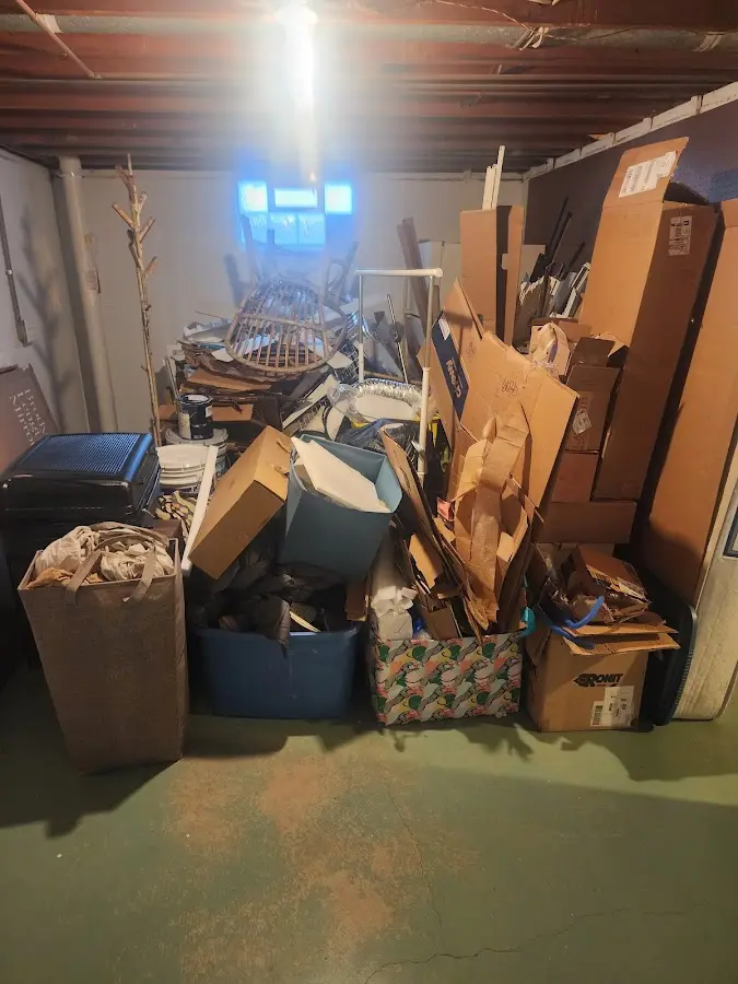 Roll-off dumpster container at job site for 15 Yard Dumpster Rental in Albert Lea